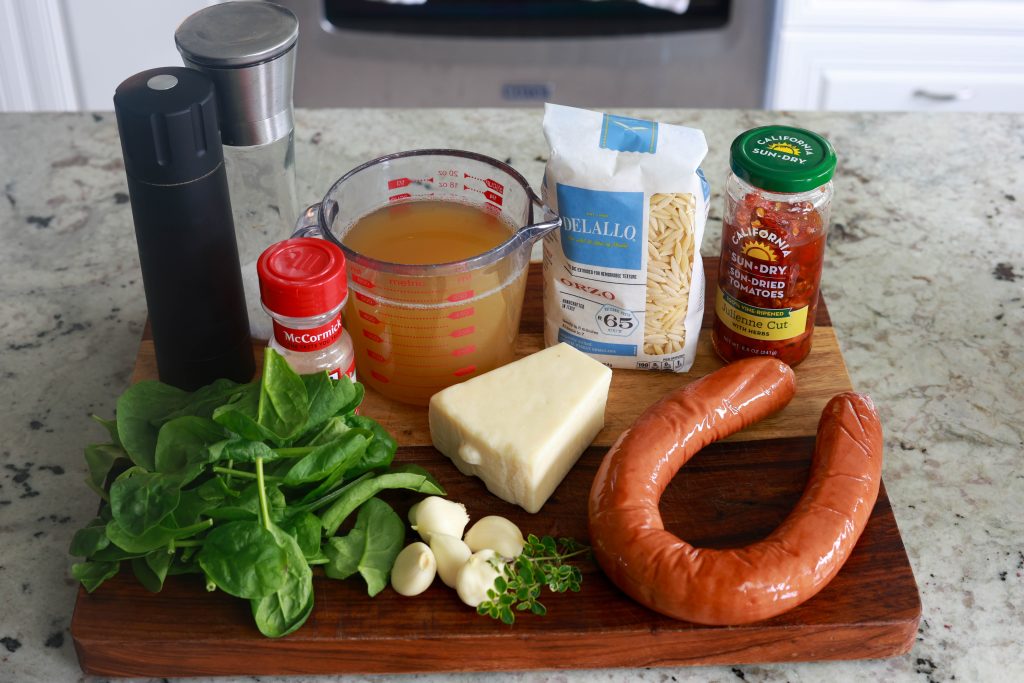 ingredients for sausage orzo skillet dinner