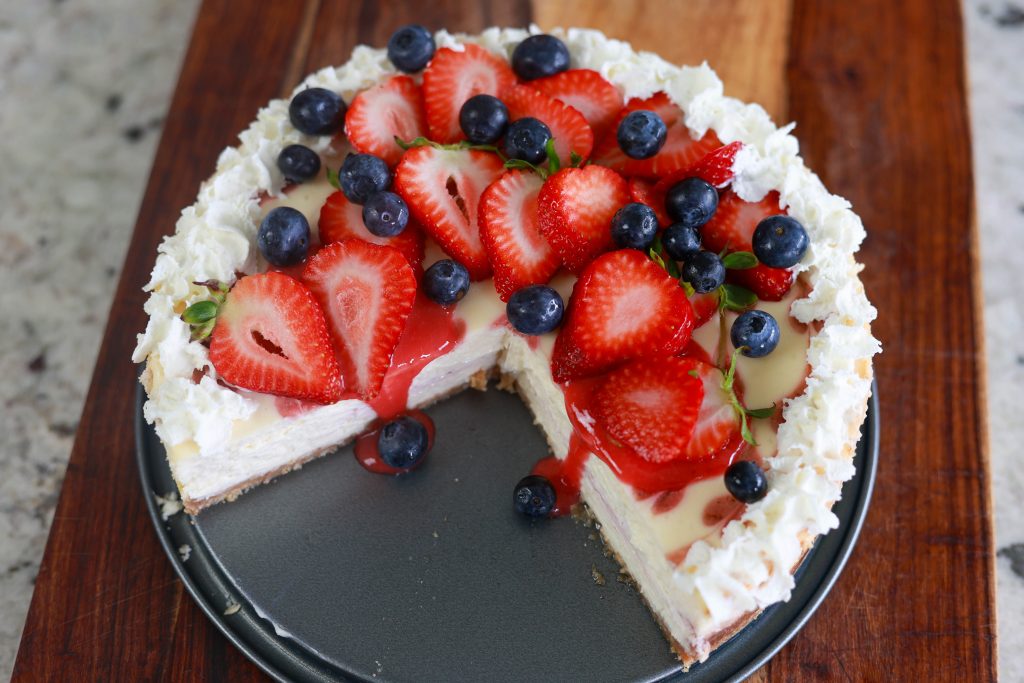 strawberry swirl cheesecake decorated in red white and blue