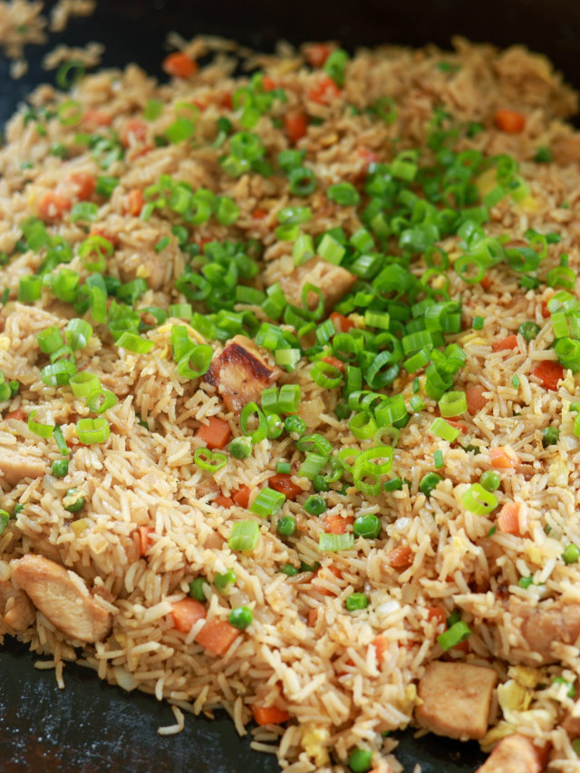 Cooking chicken fried rice on the blackstone