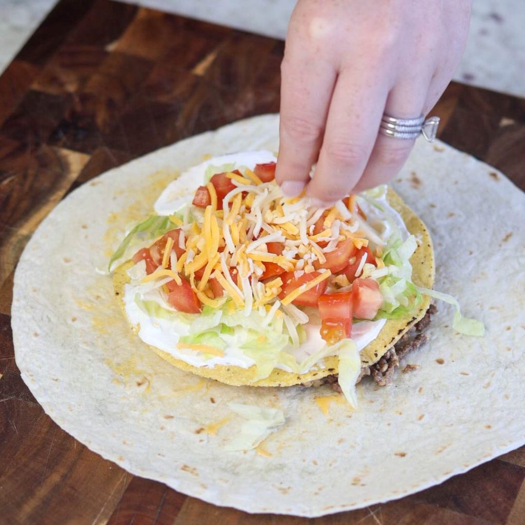 making crunchwraps on the blackstone