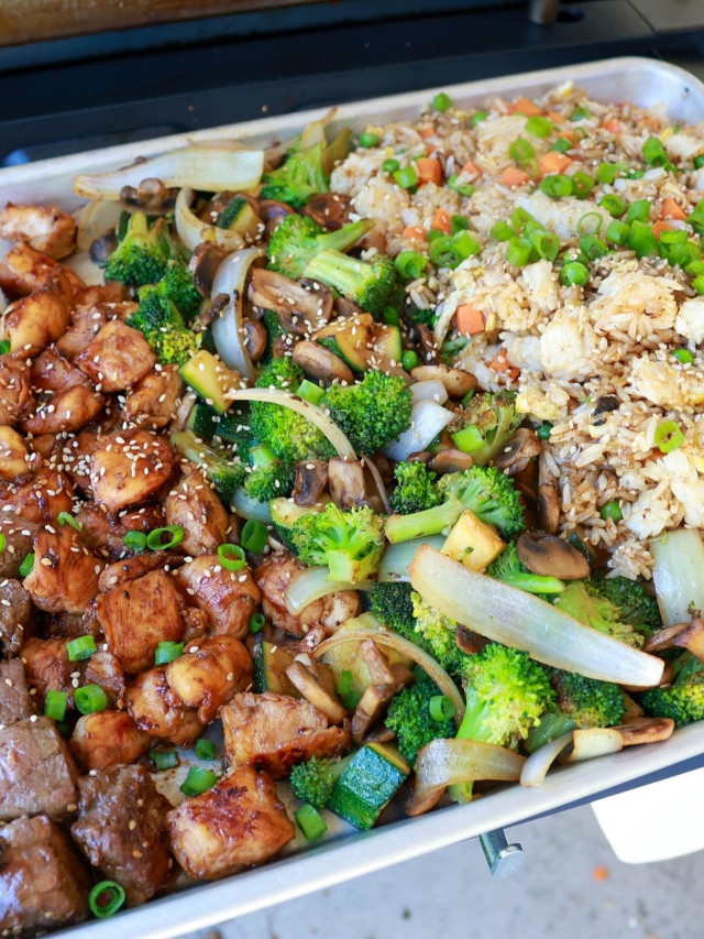 How to adapt Recipes for a Blackstone. Pictured is our Blackstone hibachi recipe. on a tray on the griddle.