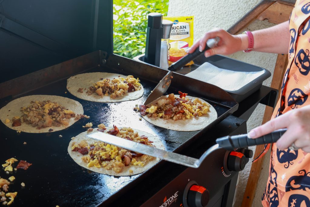 Making breakfast burritos on the blackstone