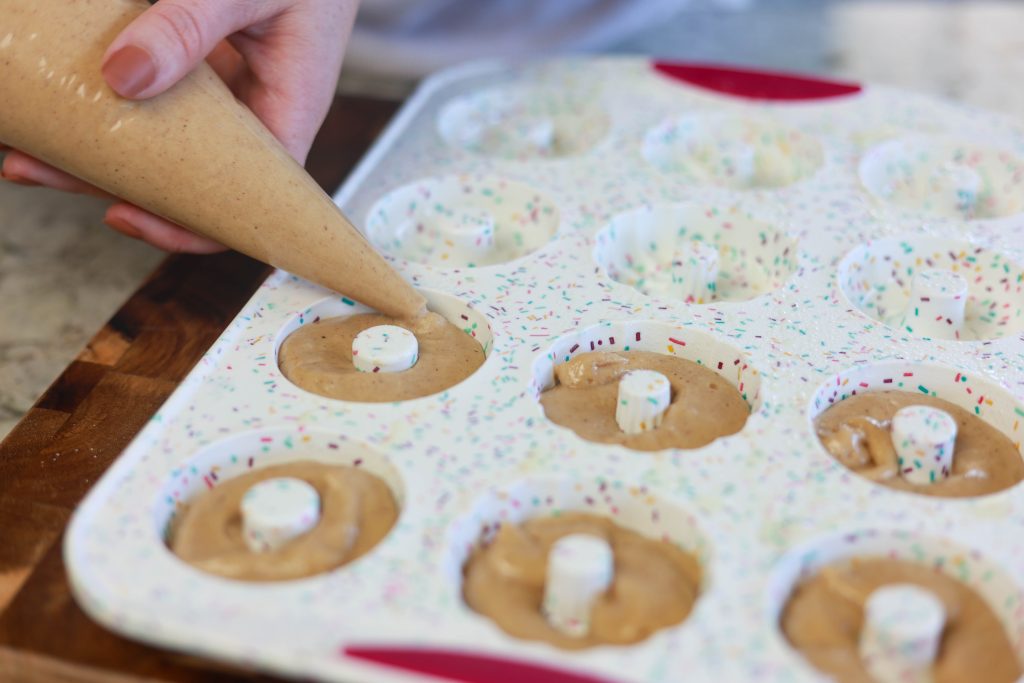 Filling donut pan for apple cider donuts