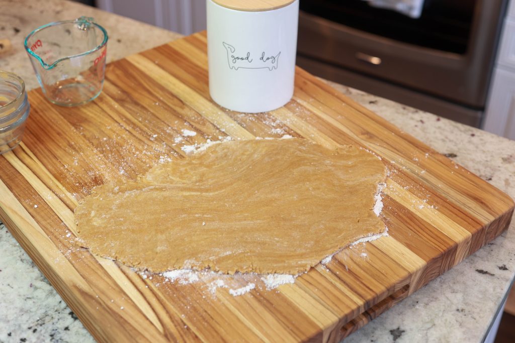 How to make Healthy Dog Treats with Just 4 Ingredients 2 rolling out dough for homemade dog treats