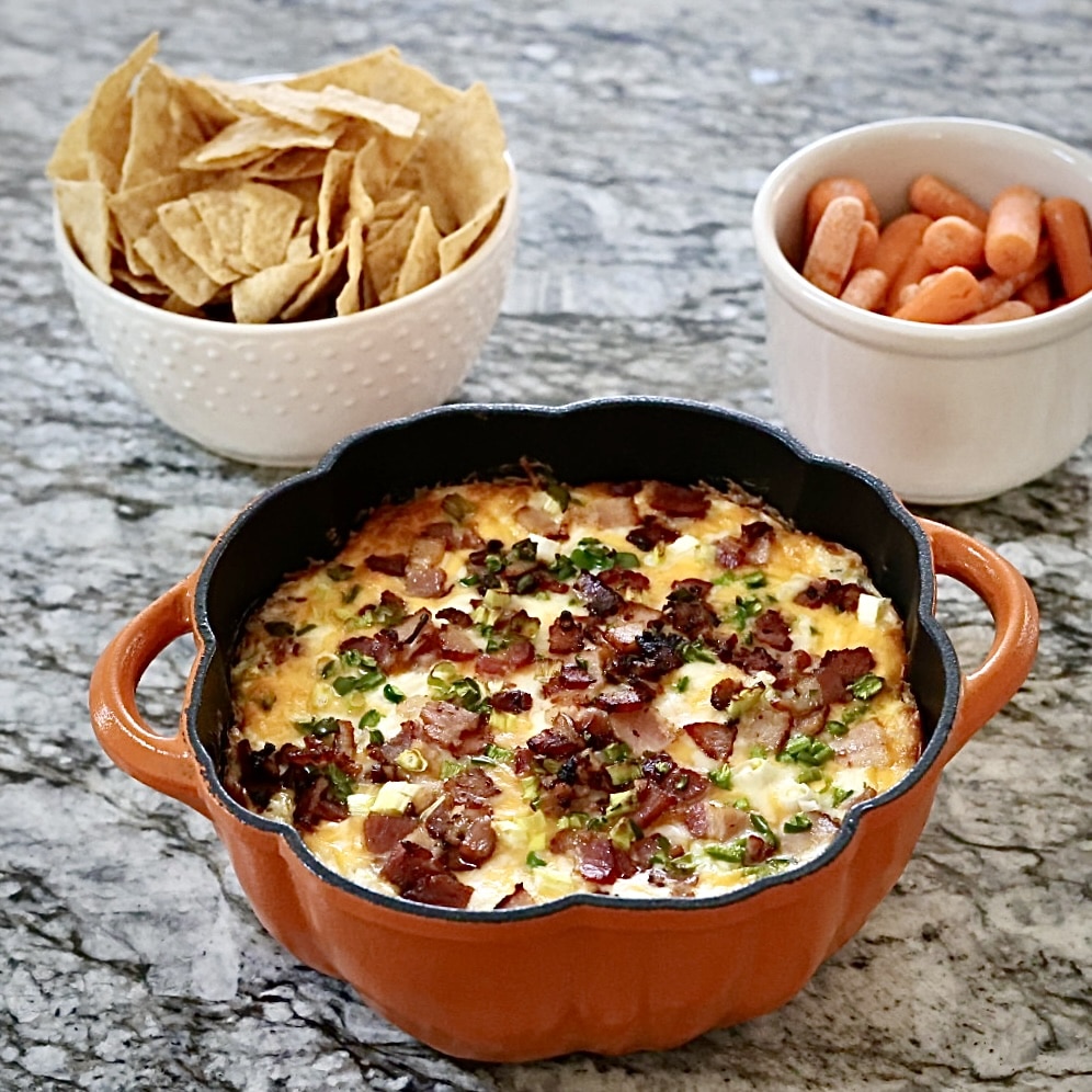 Loaded Chicken Bacon Ranch Dip Recipe 5 Baked dip with bacon. chips and carrots to dip.