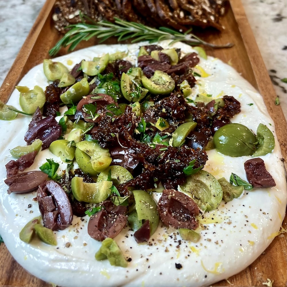 mediterranean whipped feta appetizer with sun dried tomatoes and olives