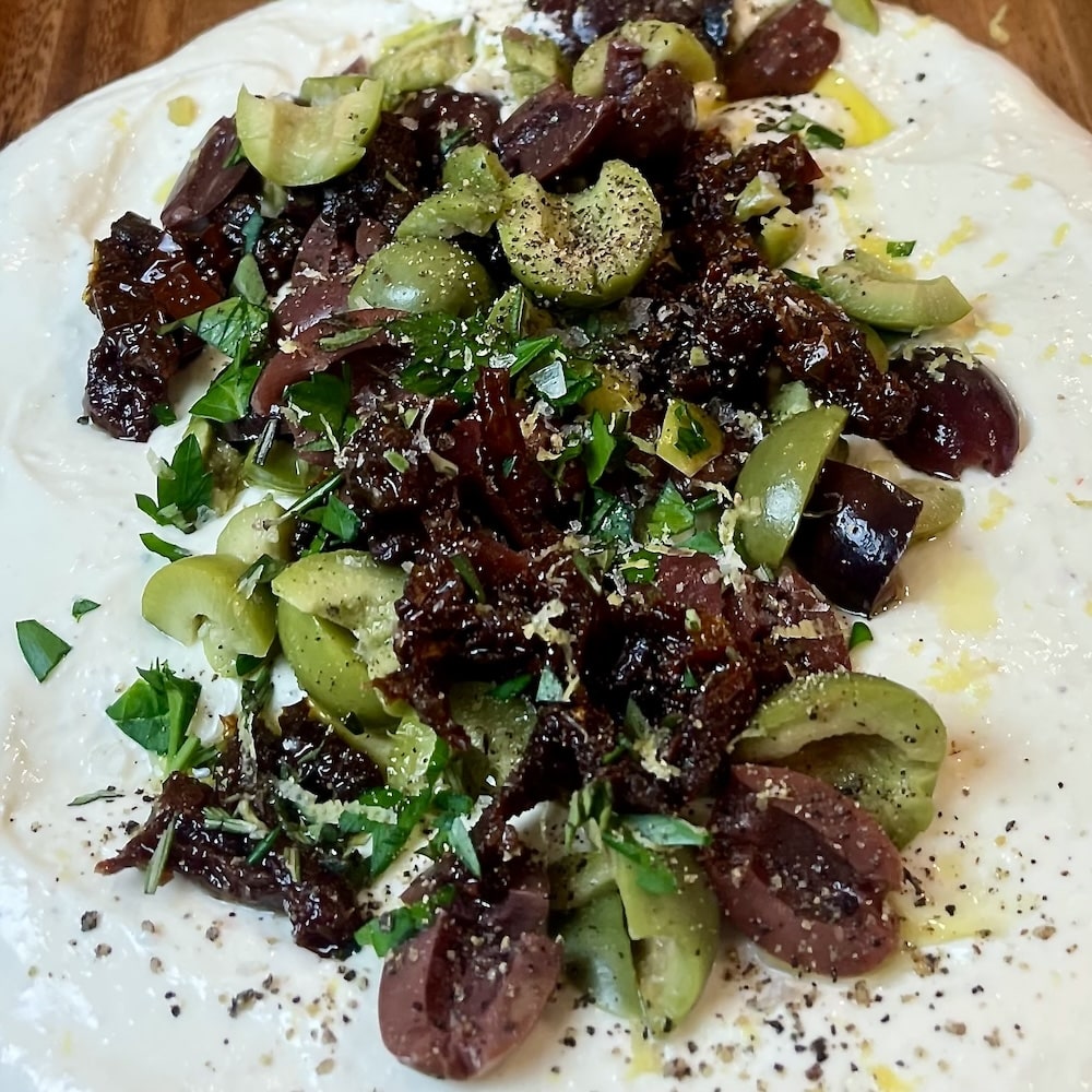 whipped feta appetizer with mediterranean toppings