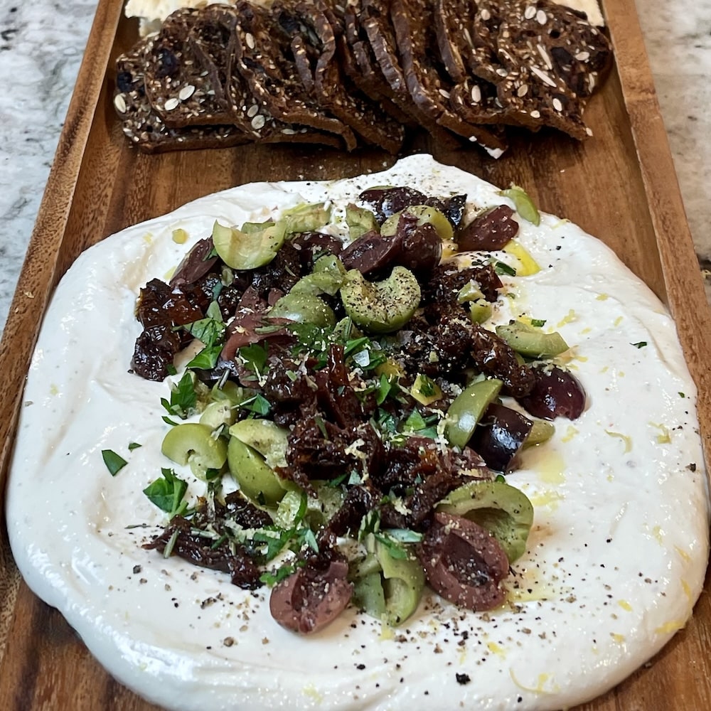 mediterranean whipped feta appetizer with sun dried tomatoes and olives