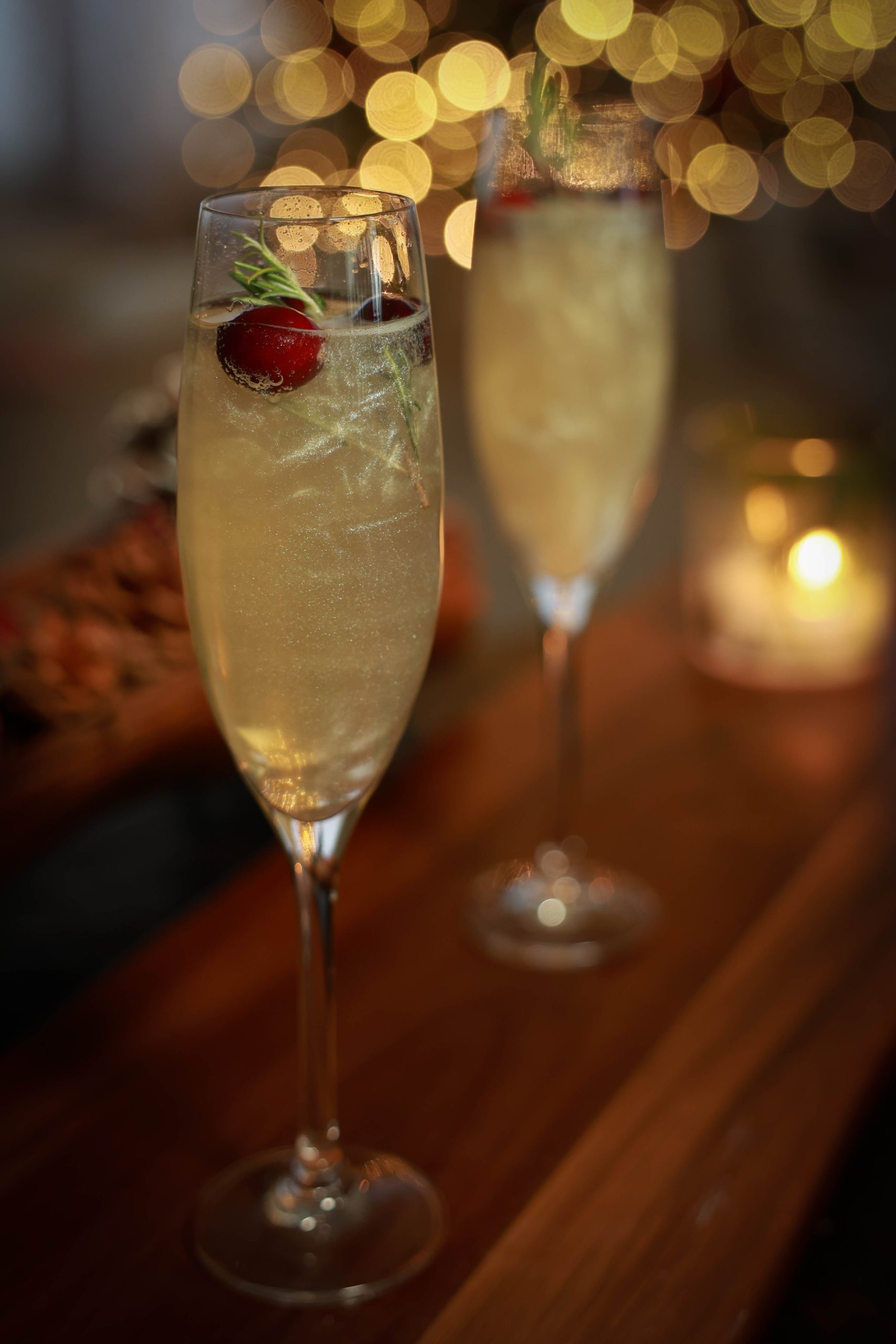 White Cranberry Mimosa Recipe with Rosemary 1 white cranberry mimosa with edible glitter