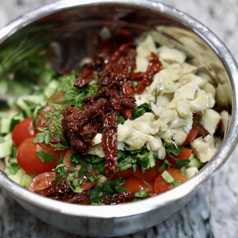 assembled Mediterranean lemon herb dense bean salad
