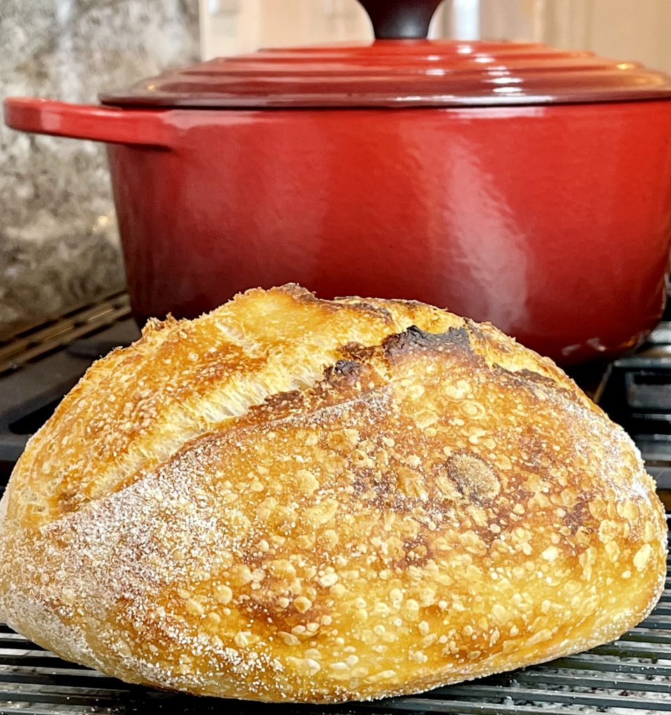 What Is Dough Structure in Sourdough? 17 Oval sourdough loaf crumb showing properly balanced hydration and fermentation, but weak dough structure shown in sloping shoulders