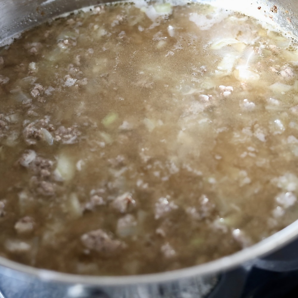 building broth for ground beef stroganoff with egg noodles