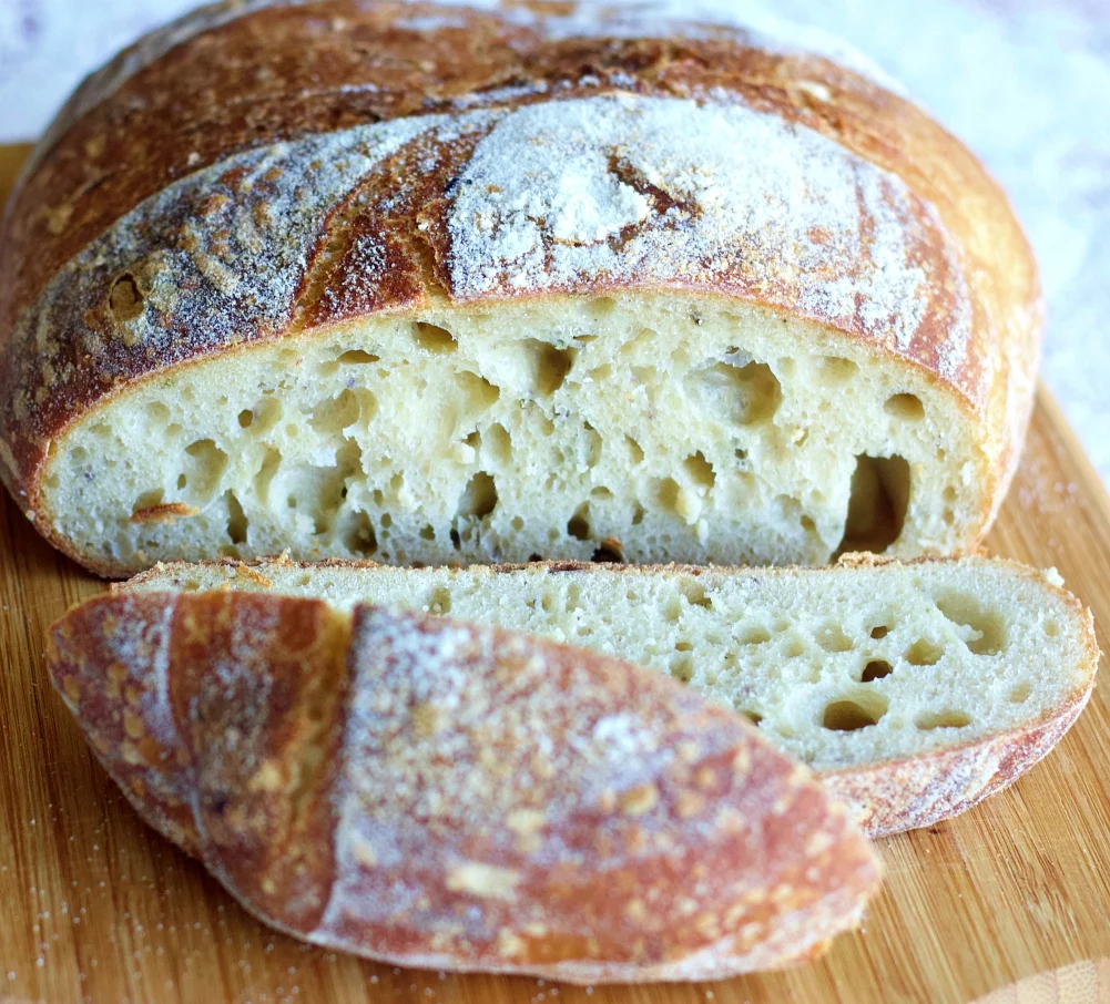 well risen sourdough bread with open crumb showing ideal fermentation and oven spring