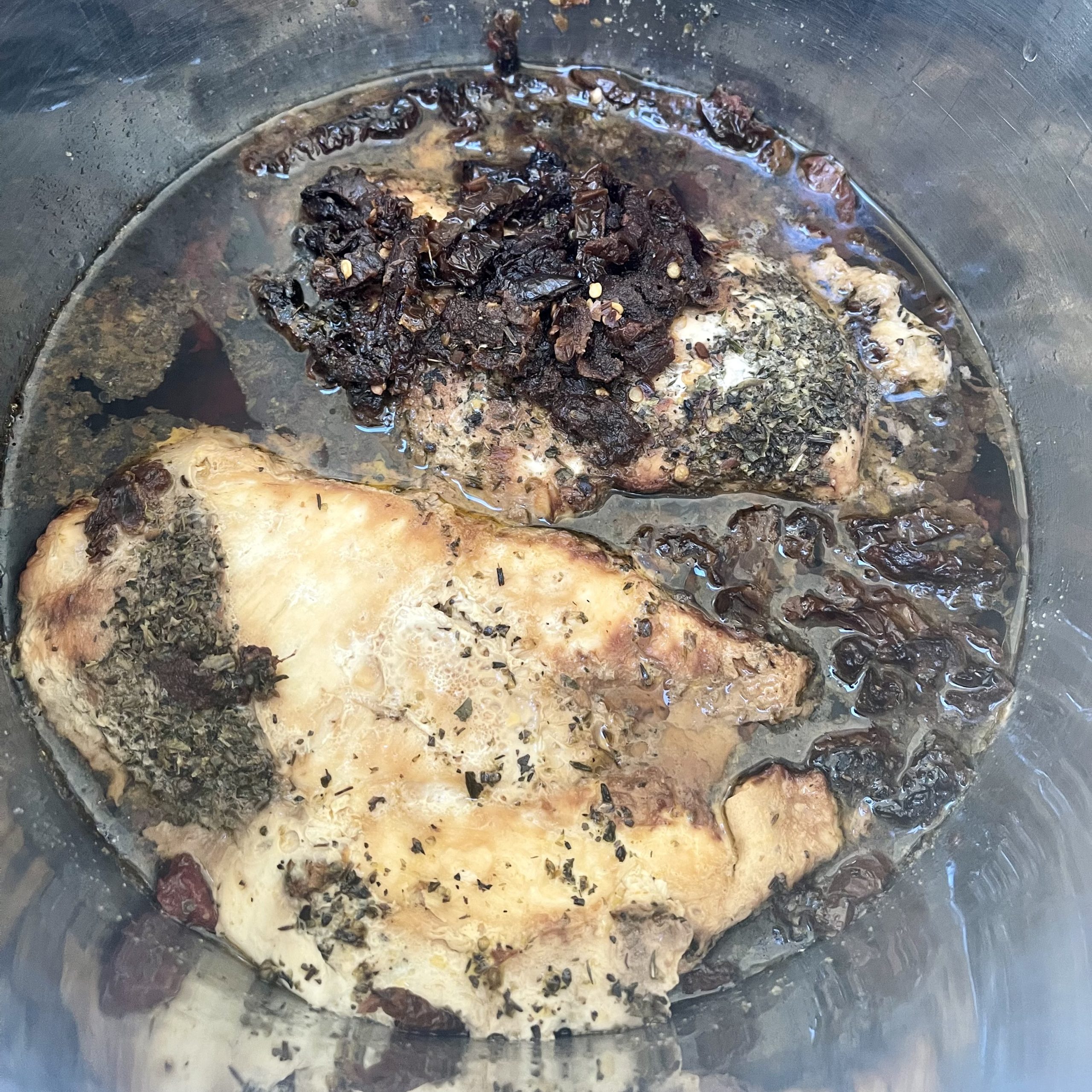 building crockpot Tuscan Chicken in the slow cooker