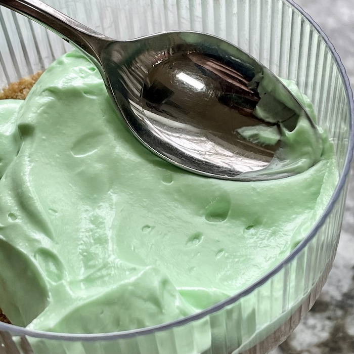 smooth the top of the cup with a spoon