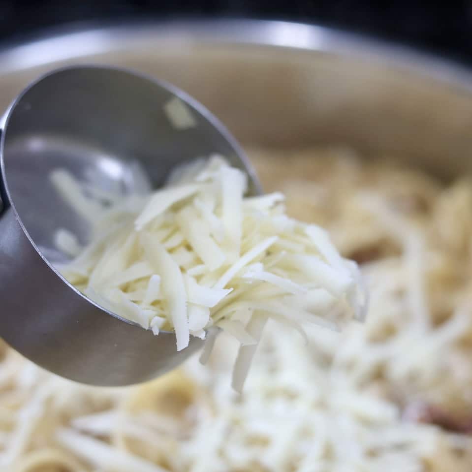 adding parmesan-