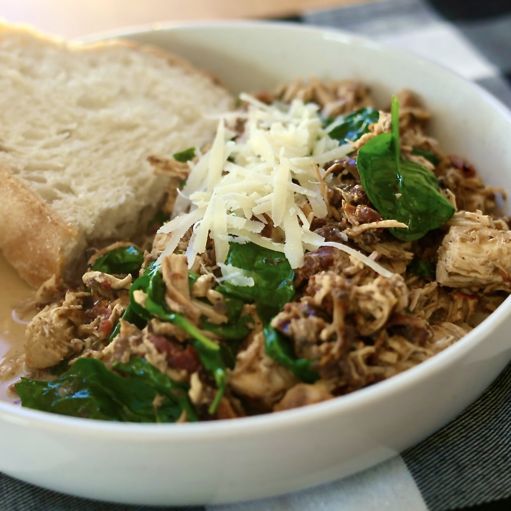 crockpot tuscan chicken served with bread