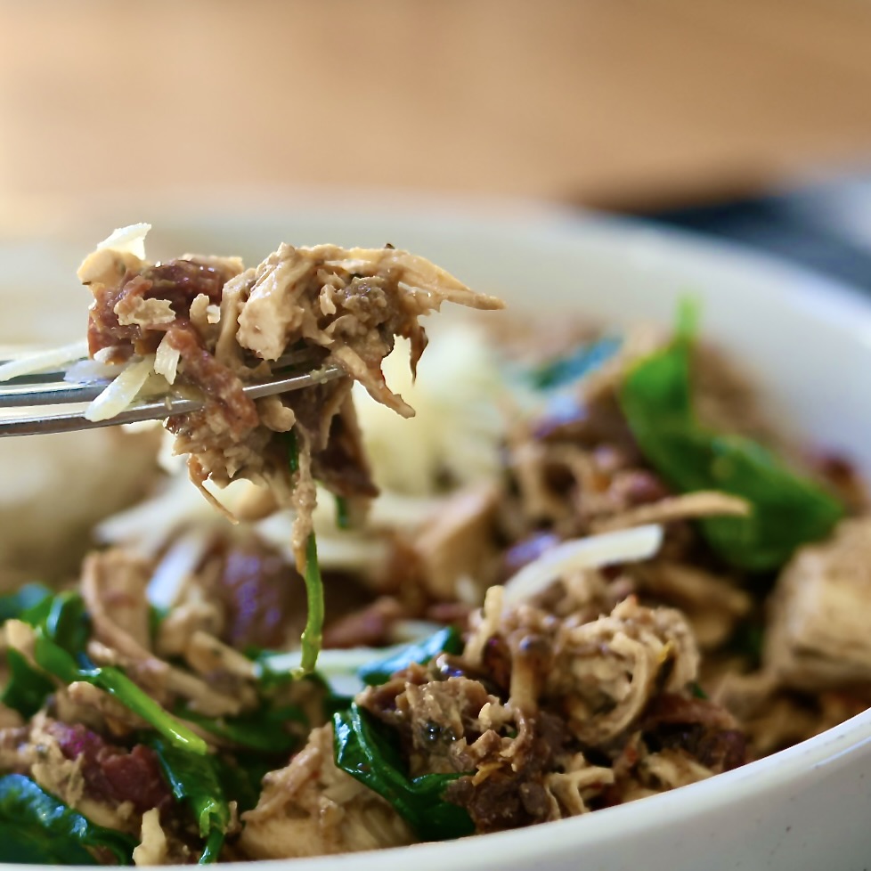 forkful of crockpot Tuscan chicken