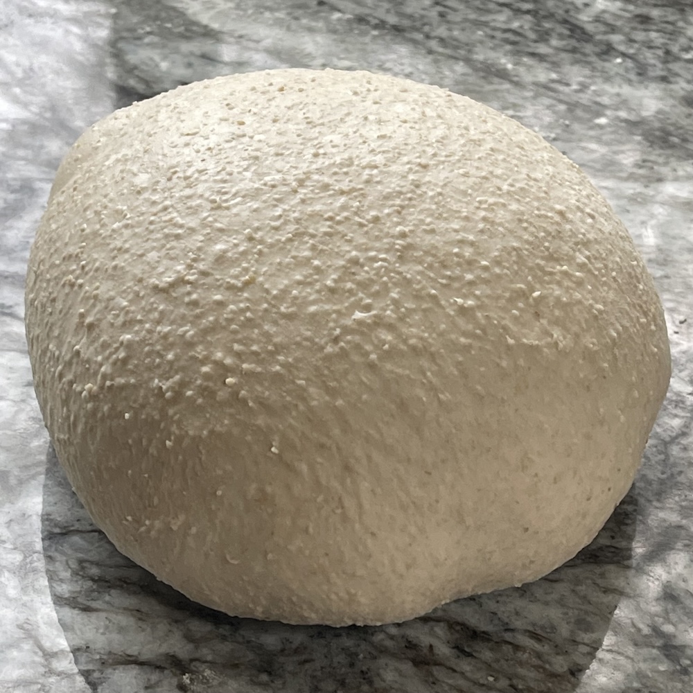 properly shaped dough for a boule