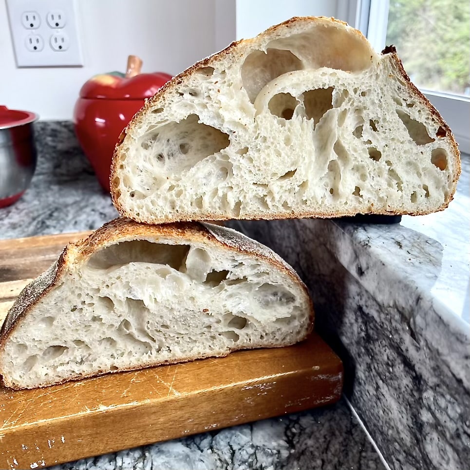 How to Control Sourdough Crumb (Open vs Soft Sandwich Style) 11 crispy crusted sourdough with large irregular holes in crumb