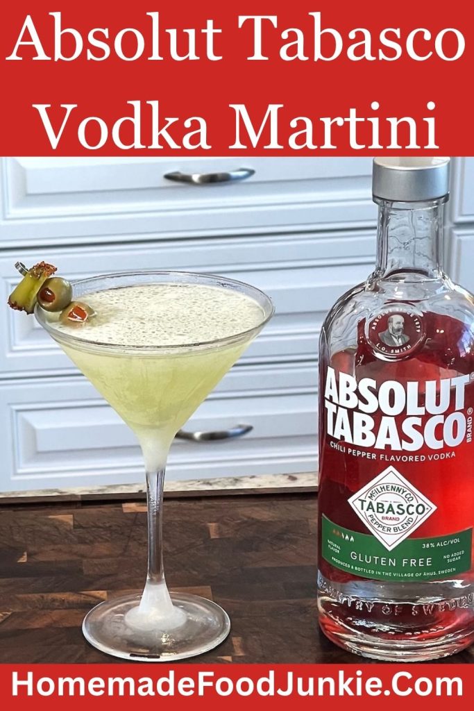 Savory Absolut Tabasco Vodka Martini with tangy dill pickle flavor, and a classic martini finish in every sip. Pictured with a bottle of absolut tabasco vodka