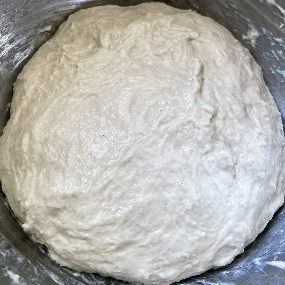 bassinage helps water absorb into a difficult dough